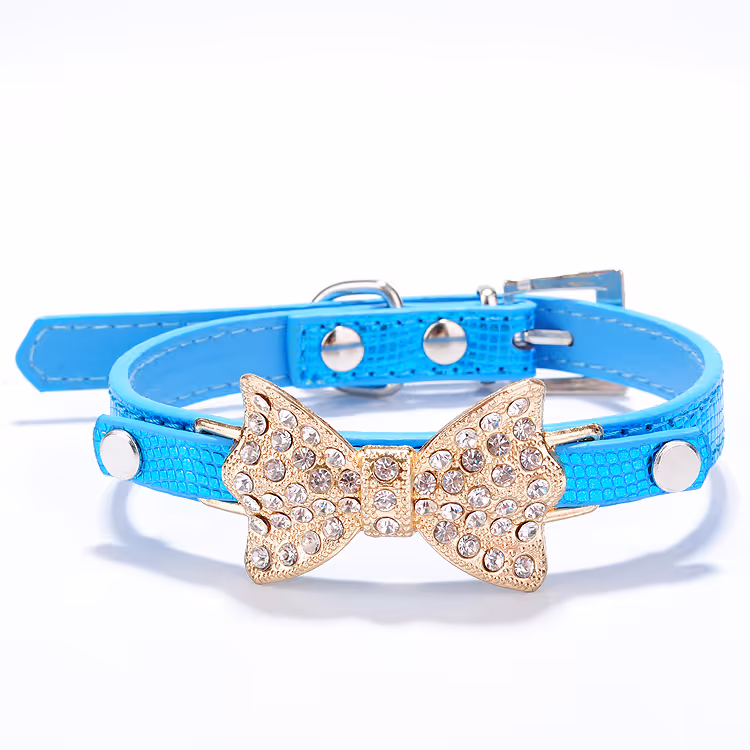 For the pup who walks like they own the runway — the Wandr Rhinestone Bow Collar is a must-have statement piece. Sparkling with crystal flair and finished in faux leather elegance, this collar isn’t just an accessory — it’s an attitude.

✨ Features:

Rhinestone Bling – Gold bow centerpiece encrusted with shimmering stones for full diva energy

Faux Leather Finish – Sleek, durable, and gentle on your pup’s neck

Adjustable Fit – Available in XS, S, and M for a custom, comfy fit

Style That Pops – Choose from a rainbow of colors to match any mood or outfit

